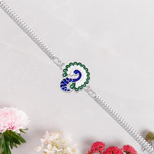 Peacock Design Metal Chain Rakhi With Blue Green And White Stone Work