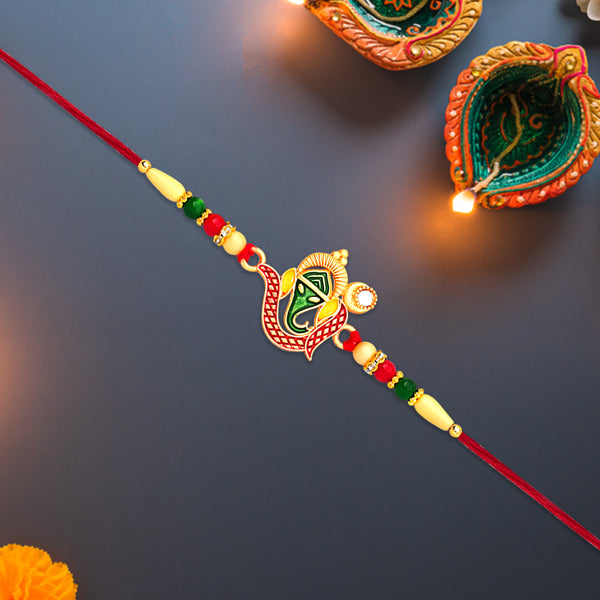 Green Enamel Lord Ganesha Rakhi With Decorative Red Thread And Golden Accents