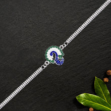 Peacock Design Metal Chain Rakhi With Blue Green And White Stone Work