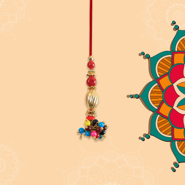 Bhabhi Lumba Rakhi With Multicolor Beads And Golden Floral Charm On Red Thread